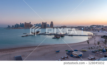 View from Katara Beach day to night timelapse in Doha, Qatar, towards the West Bay and city center 128045832