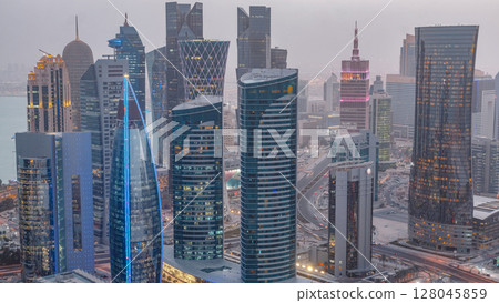 The skyline of the West Bay area from top in Doha day to night timelapse, Qatar. 128045859