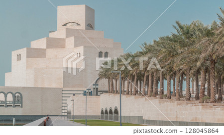 Qatar's museum of Islamic Art timelapse on its man-made island beside Doha Corniche 128045864