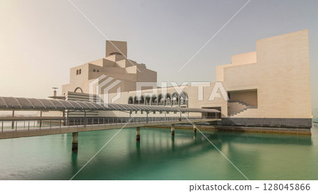Qatar's museum of Islamic Art timelapse hyperlapse on its man-made island beside 128045866