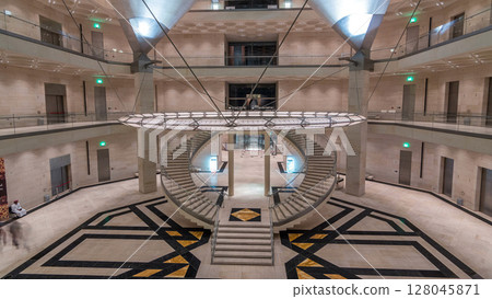 Inside view of the iconic Museum of Islamic Art building timelapse hyperlapse. 128045871