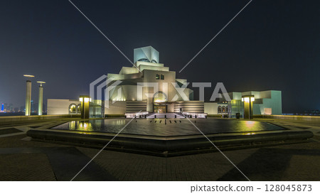 Beautiful Museum of Islamic Art night timelapse hyperlapse in Doha, Qatar. 128045873