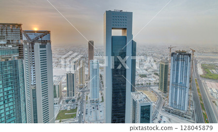 Skyscrapers at sunset timelapse in the skyline of commercial center of Doha, the capital Qatar 128045879