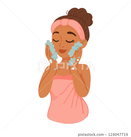 Black woman washing face with foaming facial cleanser 128047719
