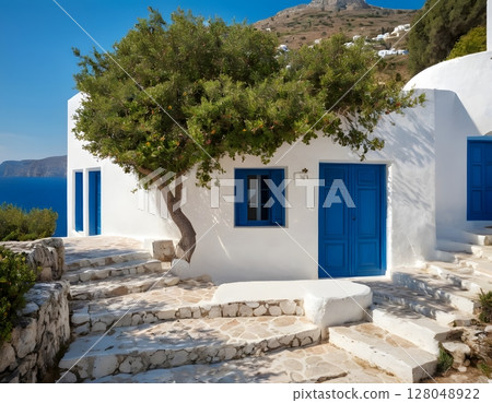 Traditional White House with Blue Doors on a Greek Island. deal for use in travel blogs, 128048922