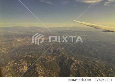 Cityscape seen from an airplane 128050024