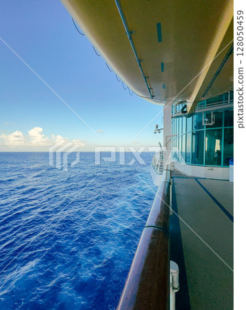 Caribbean sunset seen from a luxury cruise ship 128050459