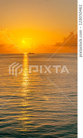 Caribbean sunset seen from a luxury cruise ship 128050462