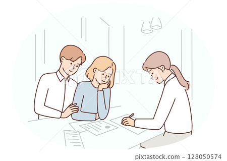 Married couple is consulting insurance agent or lawyer and drawing up marriage contract in office 128050574