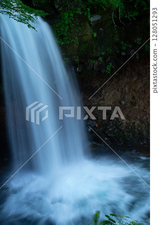 Flowing water and beautiful waterfall 128051293