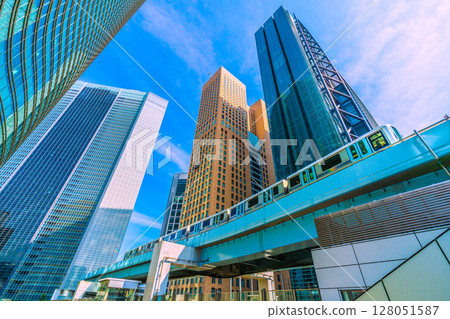 Tokyo cityscape, Japan, July 4th. View of Shiodome City Center, Dentsu headquarters and other office buildings in Shiodome. 128051587