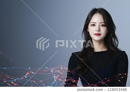 Woman is standing in front of a blue background 128053486
