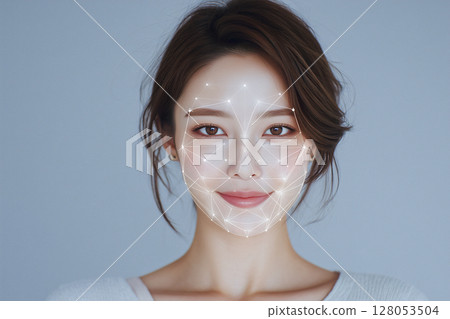 Woman with a white shirt and brown hair Woman with a white shirt and brown hair 128053504
