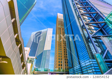 Tokyo cityscape, Japan, July 4th. View of the Shiodome office buildings, including Shiodome City Center and Nippon Television Tower. 128054152