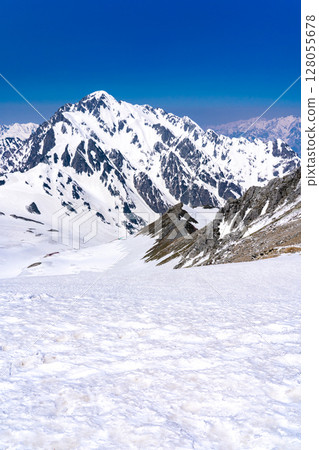 Mount Tsurugi and Tsurugisawa seen from the summit of the southern peak of Mount Betsuyama. Climbing Mount Tateyama and Mount Betsuyama in the Northern Alps in the snow season 128055678
