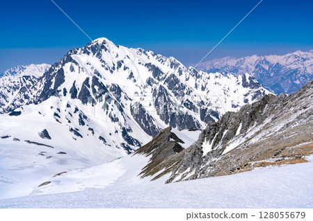 Mount Tsurugi and Tsurugisawa seen from the summit of the southern peak of Mount Betsuyama. Climbing Mount Tateyama and Mount Betsuyama in the Northern Alps in the snow season Mount Tsurugi and Tsurugisawa seen from the summit of the southern peak of Mount Betsuyama. Climbing Mount Tateyama and Mount Betsuyama in the Northern Alps in the snow season 128055679