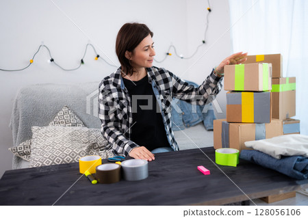 Girl Prepares Packages For Delivery, Running A Small Handmade Business At Home 128056106