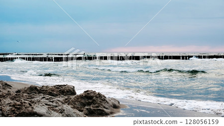 Amazing Panoramic View Of Waves Running Of The Sea Water On A Beach Amazing Panoramic View Of Waves Running Of The Sea Water On A Beach 128056159