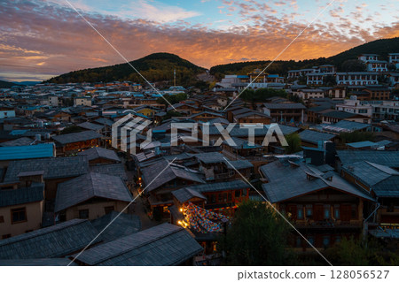 Vibrant Sunset Over Dukezong Ancient Town in Shangri-La, China 128056527