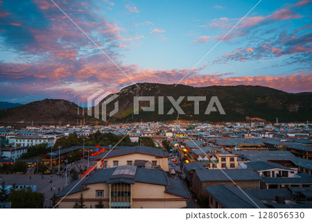 Vibrant Sunset Over Dukezong Ancient Town in Shangri-La, China 128056530