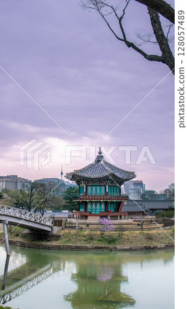 Gyeongbokgung Hyangwonjeong Pavilion in Seoul Under Cloudy Sky. 128057489
