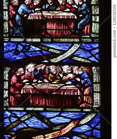The stained glass window depicts the Last Supper, with Jesus 128058508