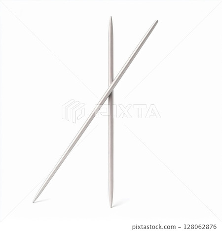 Pair of Long Silver Needles on White Background 128062876