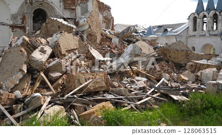View to destroyed church at Kharkivska oblast. Ruined building after bomb attacks on ukrainian territory from russia army. Consequences of russian invasion of Ukraine. Slow motion View to destroyed church at Kharkivska oblast. Ruined building after bomb attacks on ukrainian territory from russia army. Consequences of russian invasion of Ukraine. Slow motion 128063515