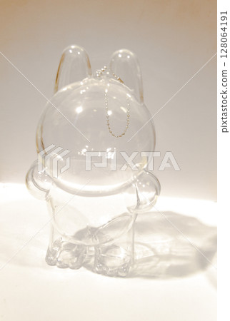 Transparent plastic case for popular toy labubu. Object Transparent plastic case for popular toy labubu. Object 128064191