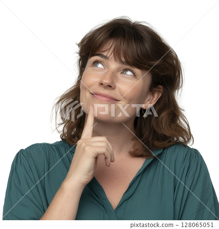 Thoughtful woman with slight smile looks upward, wearing teal blouse. Her expression suggests curiosity or contemplation. background is plain, emphasizing her facial expression 128065051
