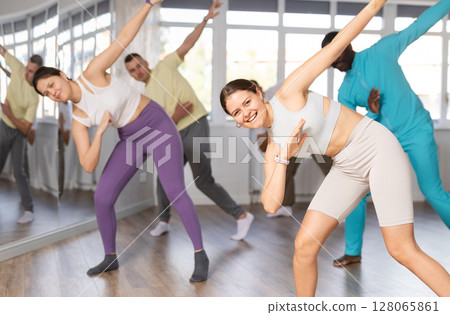 Group of people dancing hip hop 128065861