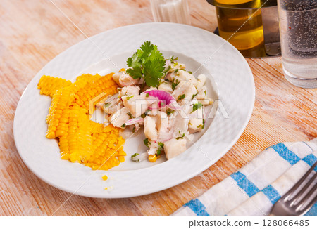 Ceviche of trout served with onion, parsley and corn 128066485