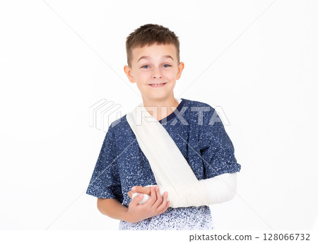 Portrait boy hand bandage isolated white background, child hand injury bandage dressing, broken hand Portrait boy hand bandage isolated white background, child hand injury bandage dressing, broken hand 128066732