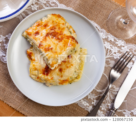Italian casserole made from filo dough, lightly salted salmon and broccoli cabbage 128067150