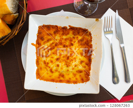 Italian casserole made from filo dough, lightly salted salmon and broccoli cabbage Italian casserole made from filo dough, lightly salted salmon and broccoli cabbage 128067263