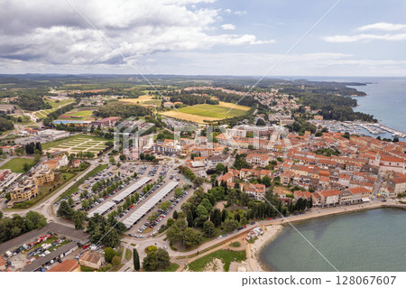 Aerial drone view of Porec coast and town in Croatia. 128067607