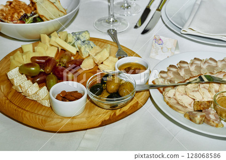 Festive delicious appetizers,snacks and salads on the banquet wedding table 128068586