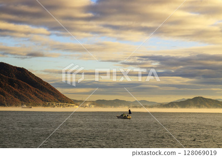 View from Sunami Port in Mihara City: Sea fog and octopus fishing boats 128069019