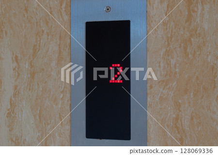 Modern Elevator Technology Interface with Illuminated Digital Floor Indicator 128069336