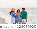 Happy family on the beach during summer vacation 128069925