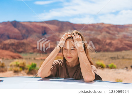 Young girl on trail at Fire Valley in Utah 128069934