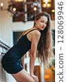 Beautiful fashion girl walking outdoor in the city 128069946