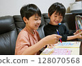 Brothers who seem to be having fun studying at home 128070568