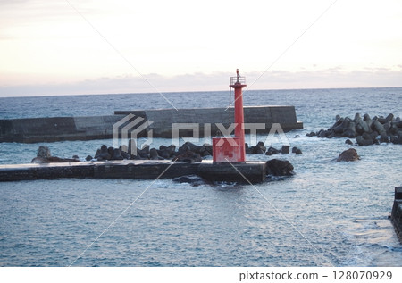 Red lighthouse and sunrise 128070929