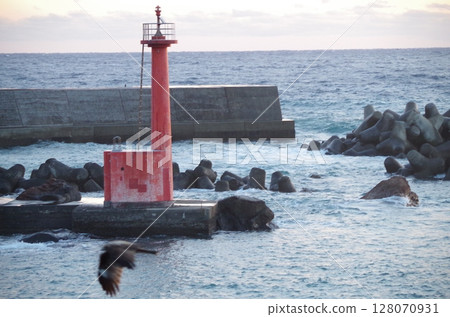 Red lighthouse and sunrise Red lighthouse and sunrise 128070931