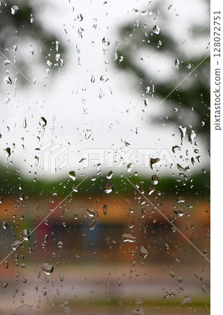 raindrops on blurred glass, background 128072751