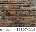 Brick of the wall and cement, The bricks are arranged neatly and glued with cement to form a wall 128074114