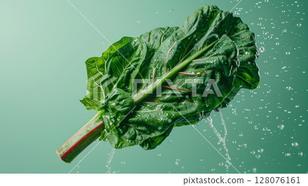 Chard vegetable fresh organic gardening flying in water with bubble 128076161