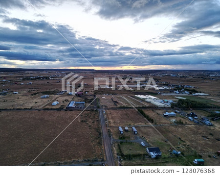 Aerial view of the town of El Calafate, Argentina at sunset 128076368