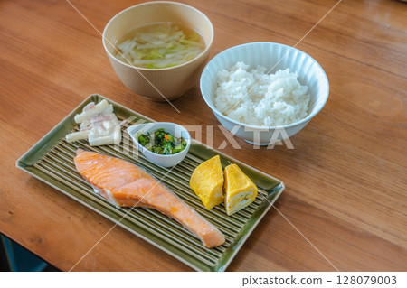 Japanese breakfast of grilled salmon and rolled egg Japanese breakfast of grilled salmon and rolled egg 128079003